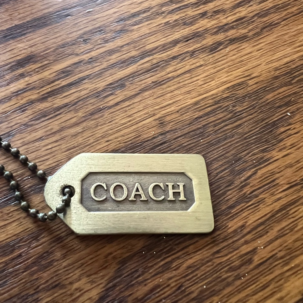 Coach Brass Hang Tag - vintage in good vintage condition